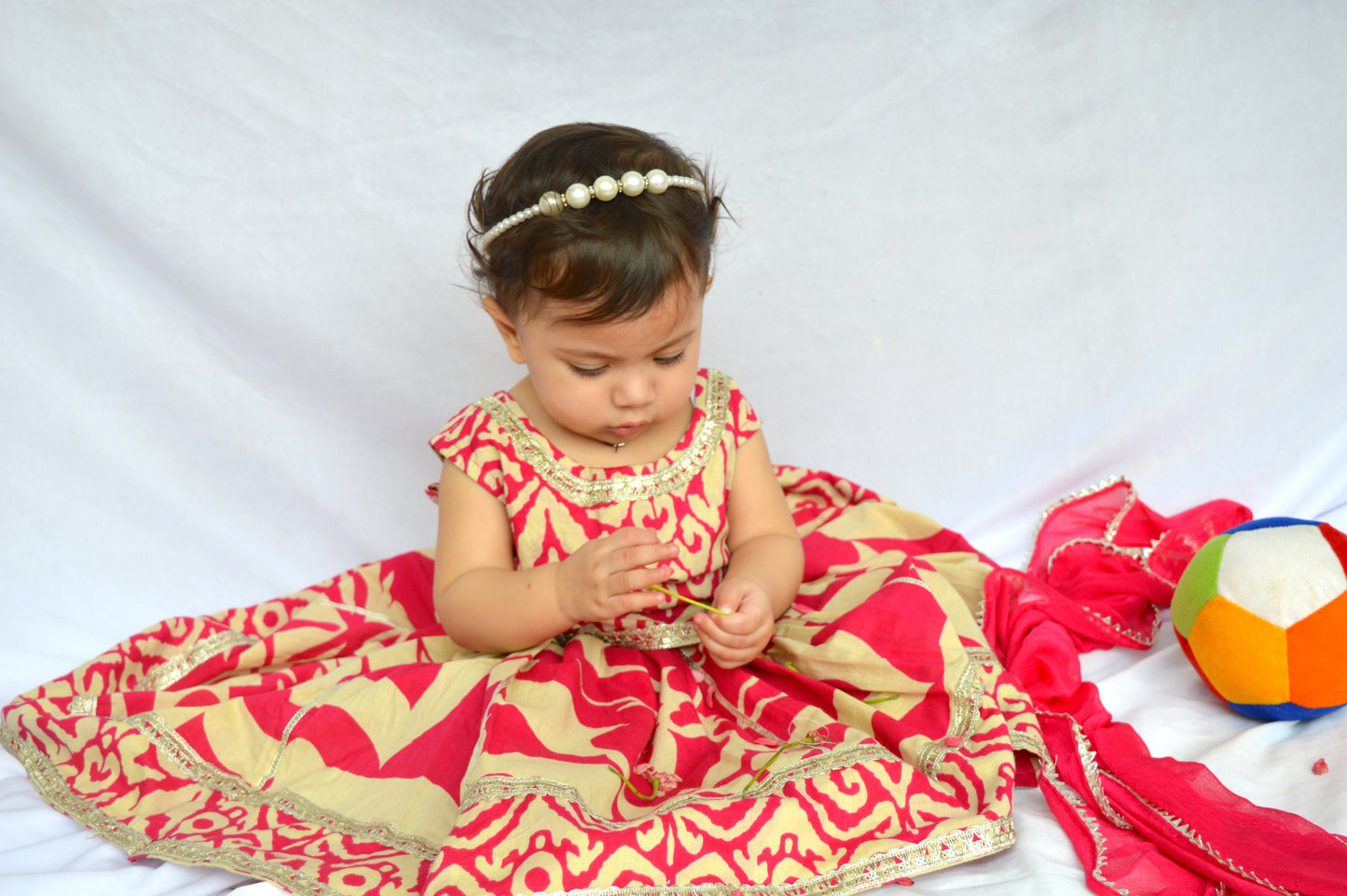 Red and beige patterned top and skirt